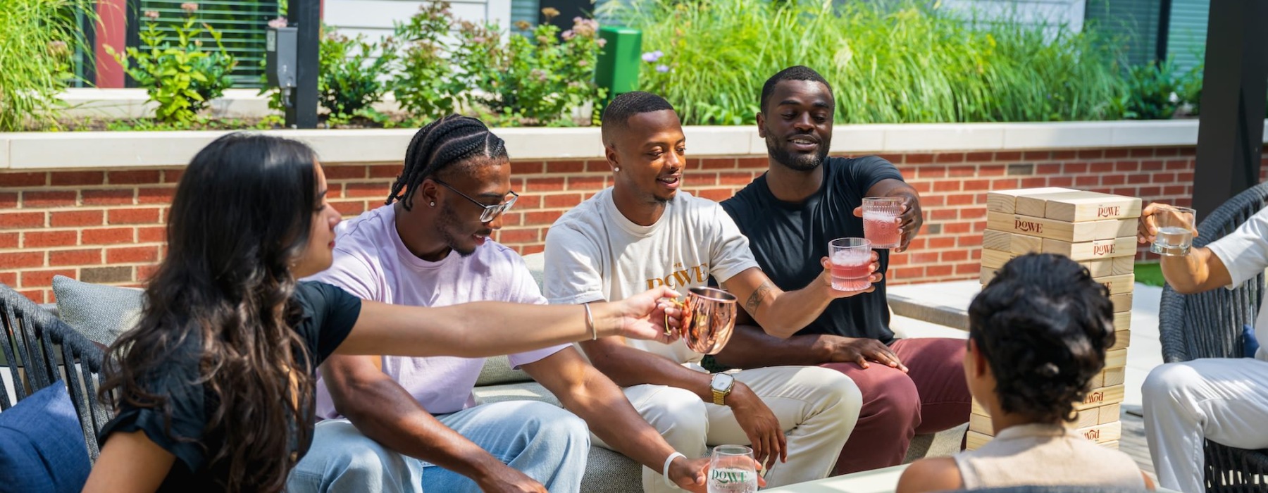 friends sitting outside with drinks